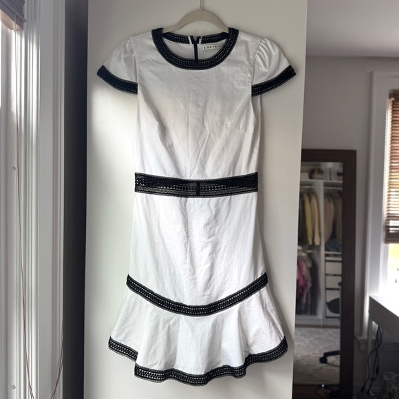 ALICE + OLIVIA | REVOLVE SAKS RAPUNZEL FLOUNCE MINI DRESS WHITE CROCHET ACCENT - Picture 3 of 7